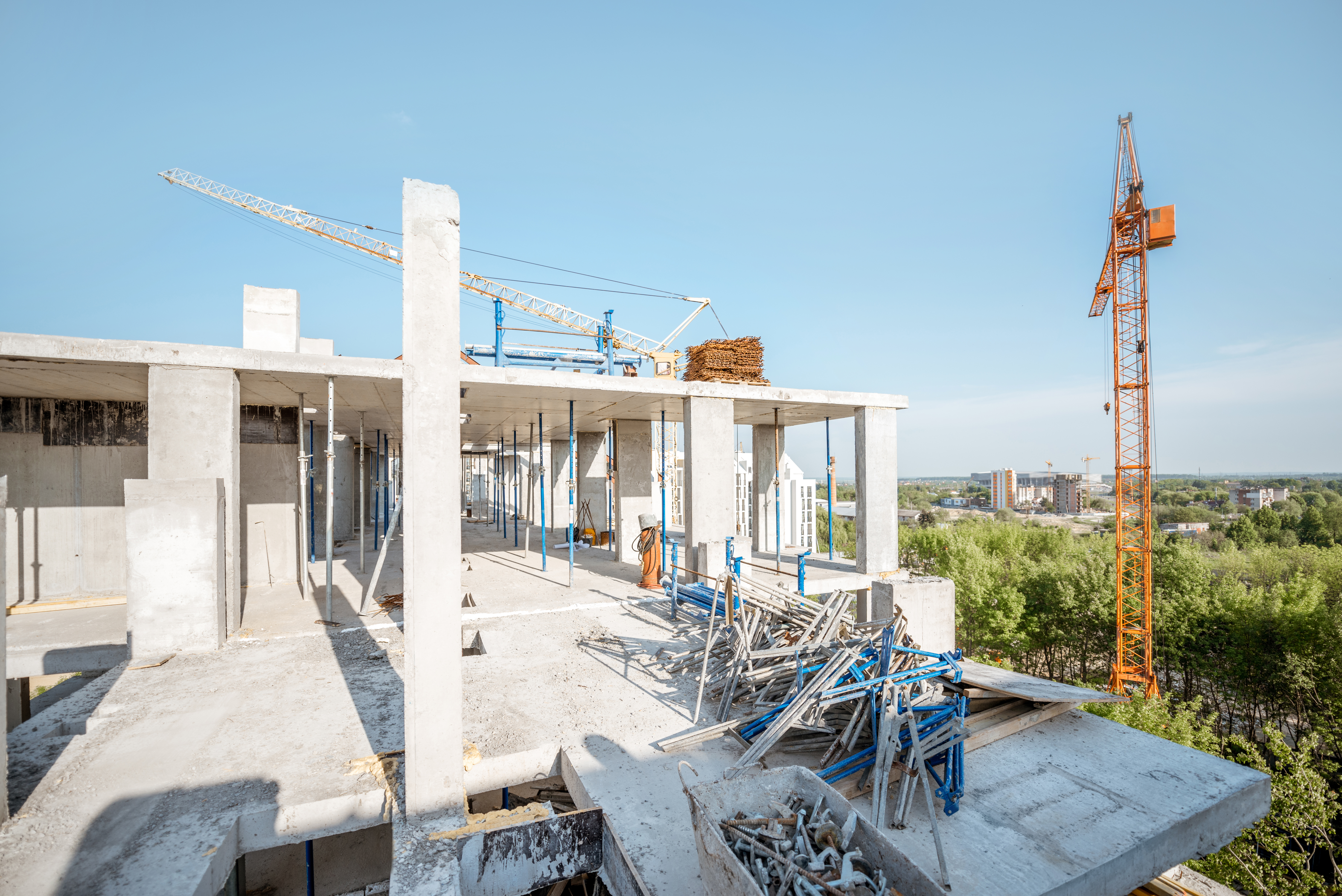 Residential building during the construction process during the sunny weather